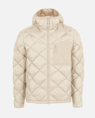 The Mountain Studio D-7 UL down jacket in beige with diamond quilted construction, storm hood, and zippered chest pocket, shown in a front-facing view highlighting its minimalist alpine design.