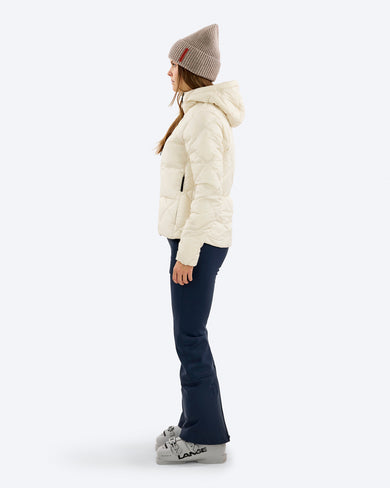 D-9 WUL Ultralight Down Hood Jacket in Almond Milk, on model side, hood up