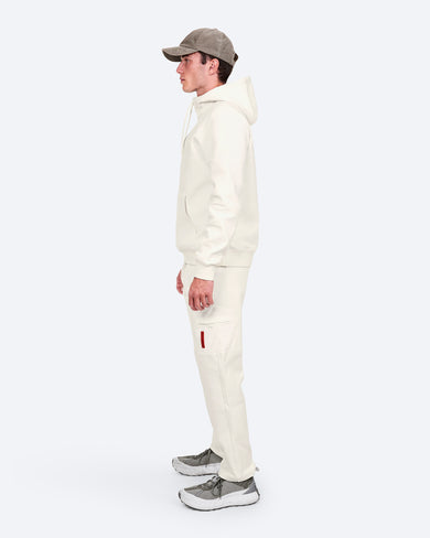 H-9 Cotton Tech Hood Half Zip, on model side, styled with matching sweatpants