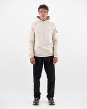 The Mountain Studio J-7 Camp 4 Pants in Black Onyx, on model front, styled with hoodie