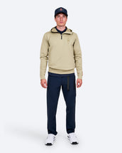 The Mountain Studio J-7 Camp 4 Pants in Sky Captain, on model front, styled with a pullover
