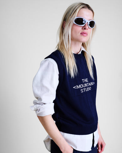 The Mountain Studio K-10 W Knit Sleeveless Pullover in Sky Captain, close-up on model front
