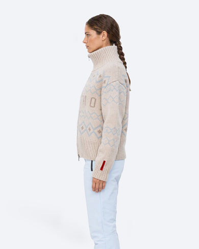 The Mountain Studio K-17 W Ski Lambswool Zip Jacket in Almond Milk, on model side
