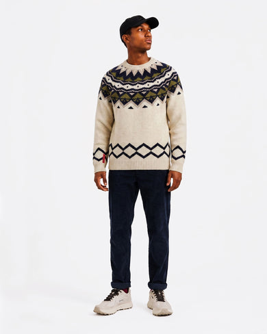 K-19 Ski Lambswool Fair Isle Sweater in Almond Milk, on model front, with cap