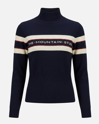 The Mountain Studio K-8 W Retro Merino Ski Sweater in Sky Captain, on model front