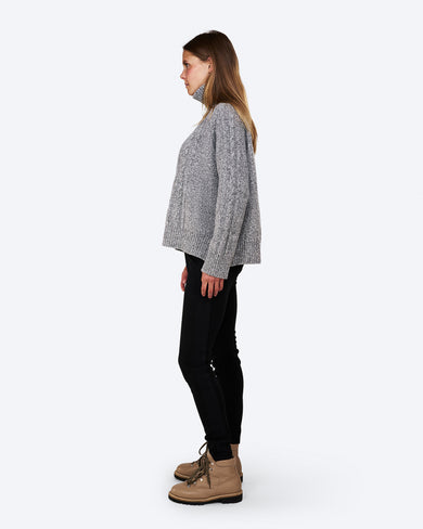 K-9 W Cashmere Mix Melange Rollerneck in Grey Melange, on model side