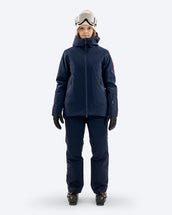 The Mountain Studio Z-8 W 3L Hybrid Shell Jacket and Y-8 W 3L Hybrid Shell Bib Pants in Sky Captain, on model front